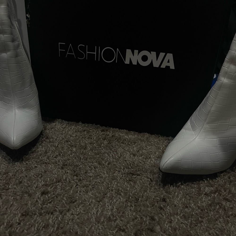 White High boot heels from fashion nova.